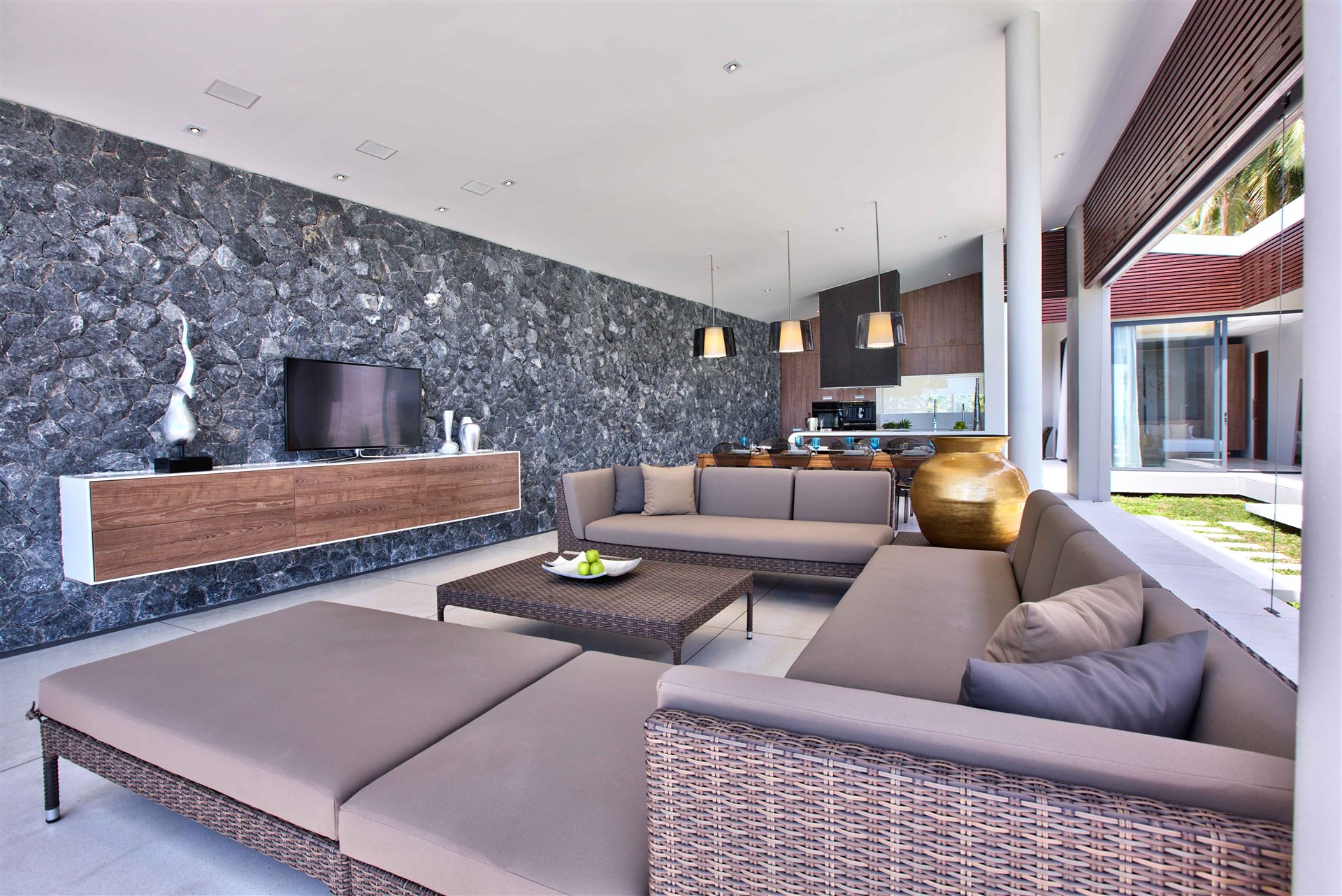 Minimal tropical villa interior facing the sea