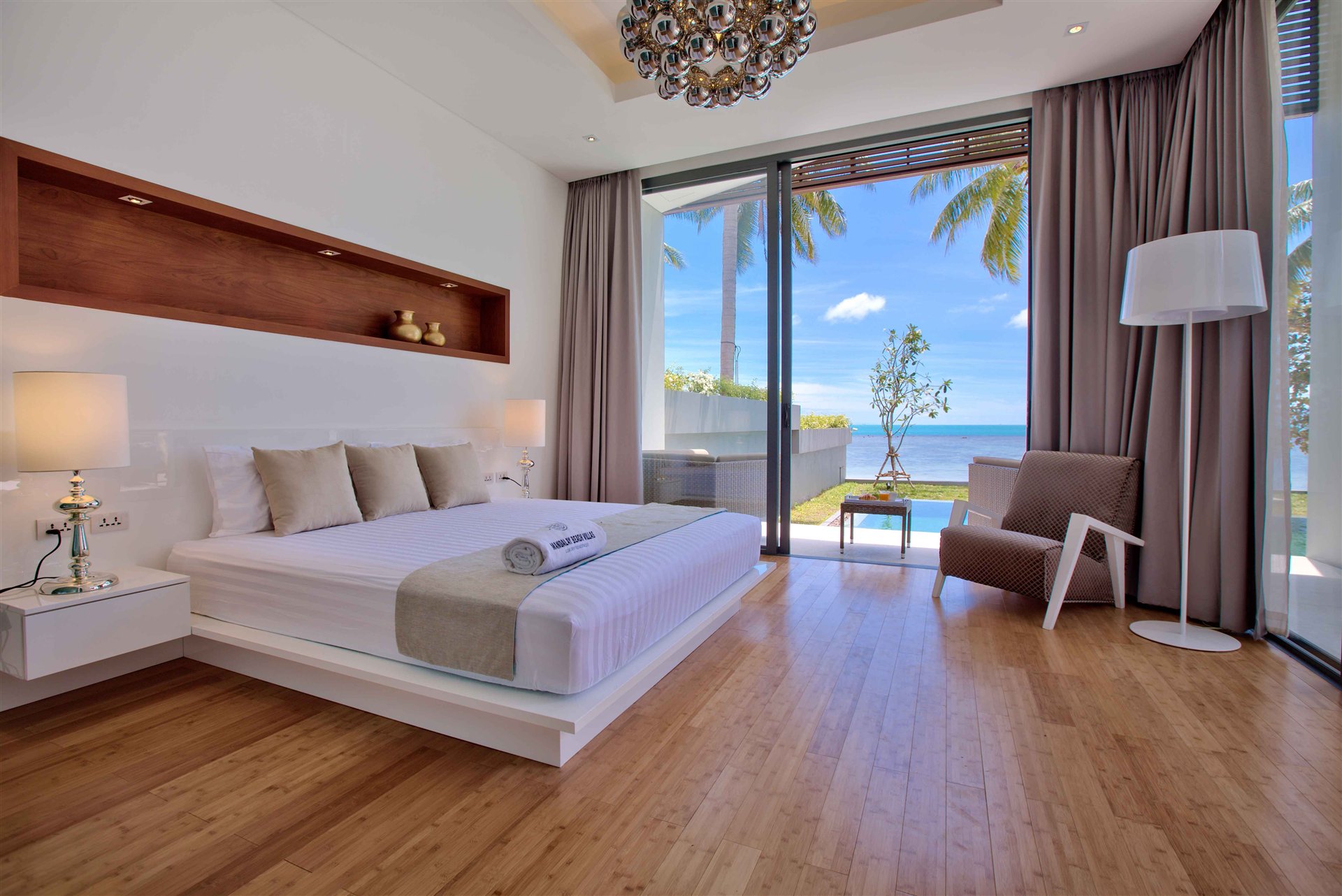 Beachfront villa bedroom with ocean view